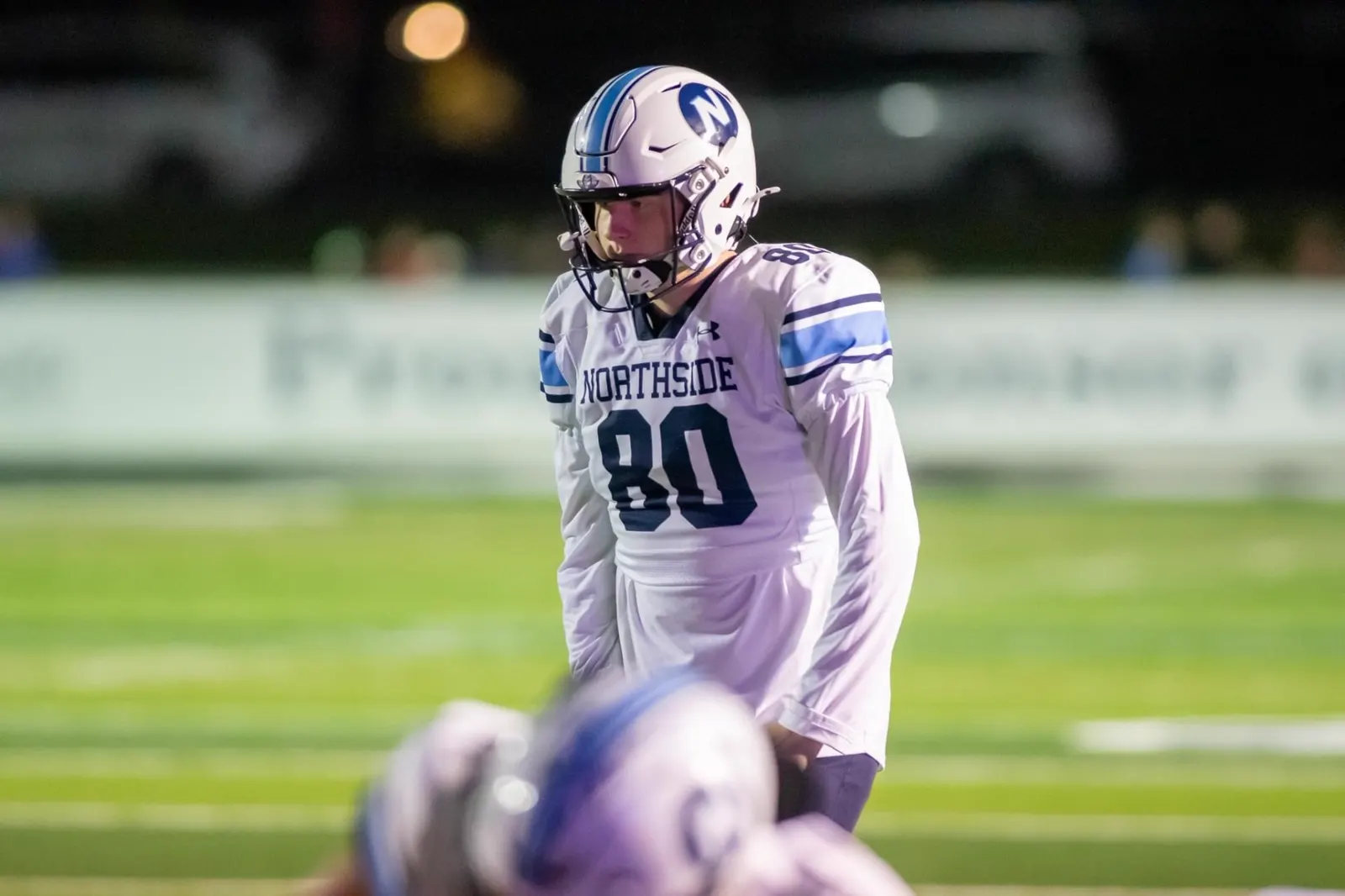 Parker Hulsey, jersey #80, on the field at Northside